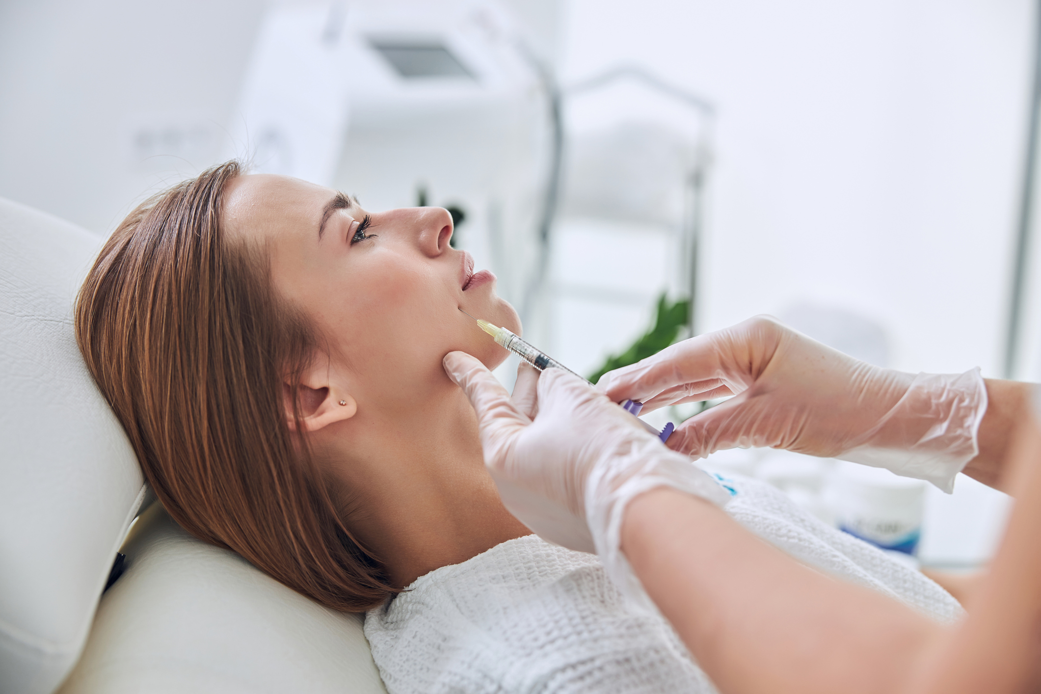 Woman receiving JUVÉDERM VOLLURE XC injections for laugh lines