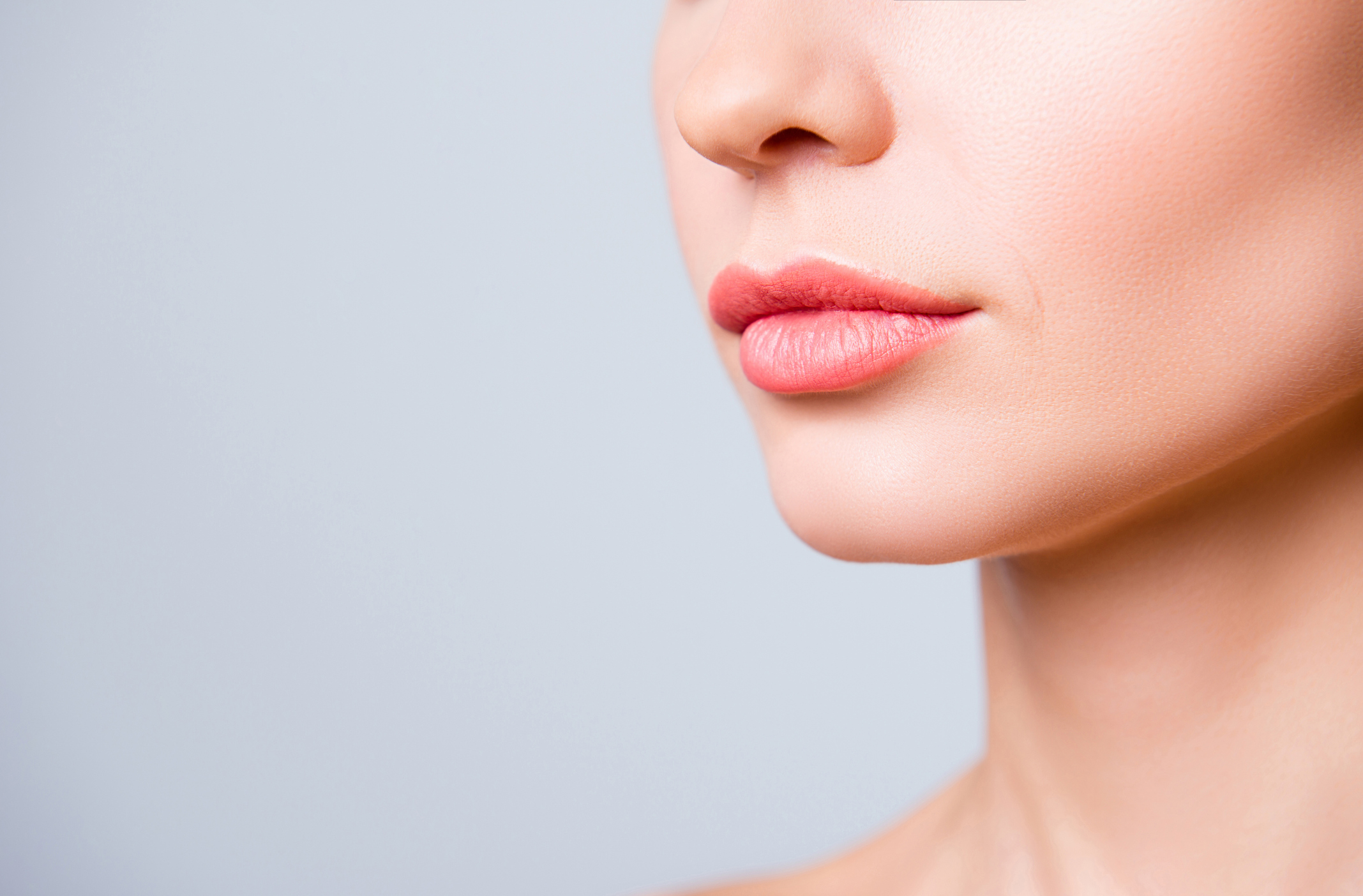 Woman with full lips after Juvederm Volbella XC